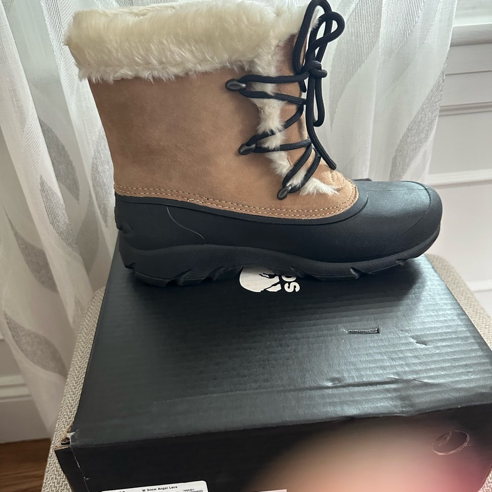 Brand new never worn Sorel snow angel lace up winter boots, size 9